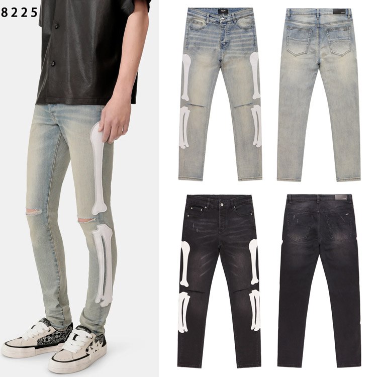 AMIRI's popular bone-embroidered washed denim jeans -2