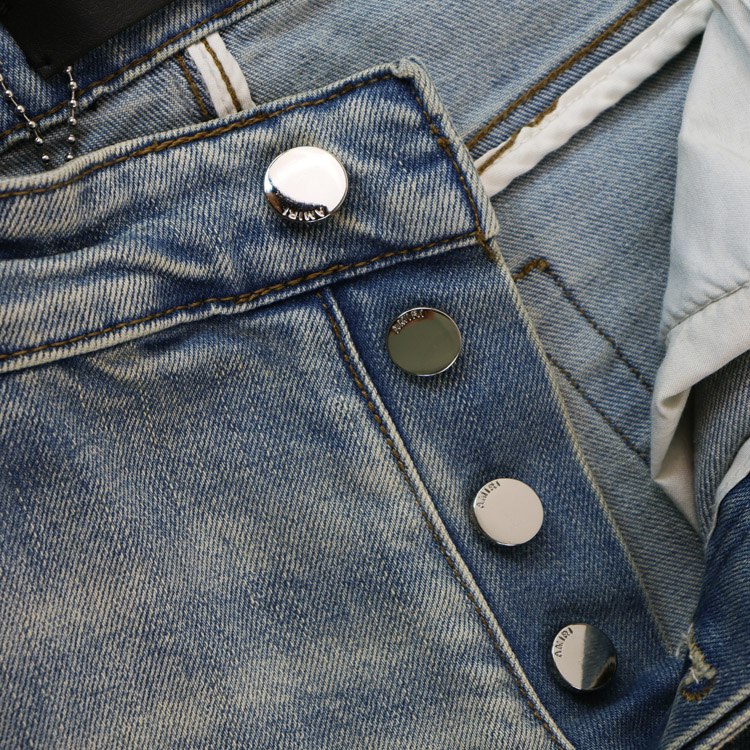 AMIRI's popular bone-embroidered washed denim jeans -3